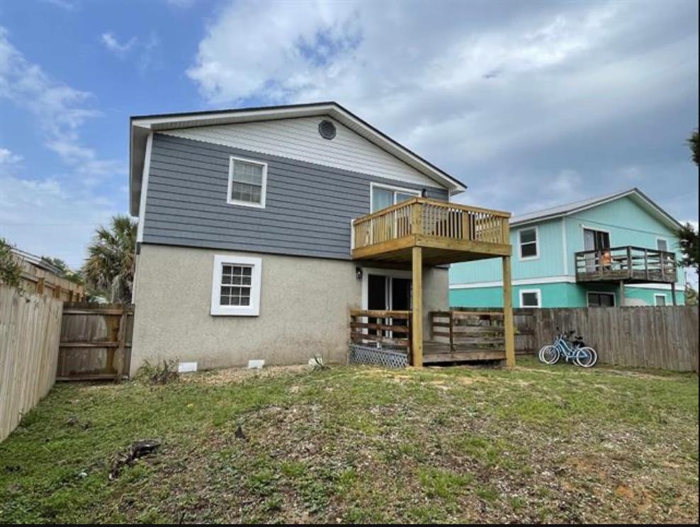 203 10th Street St. Augustine, FL 32080 - Photo 1 of 1 front view of a house with a yard