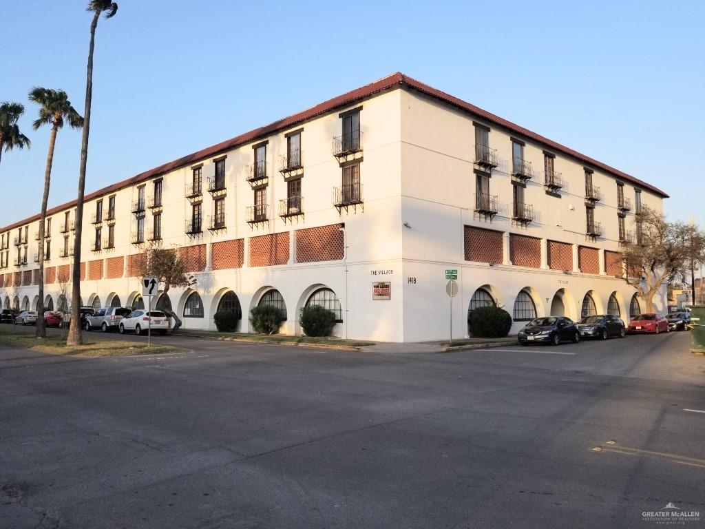 1418 Beech Avenue, Unit 3 McAllen, TX 78501 - Photo 1 of 1 a view of a building with a street