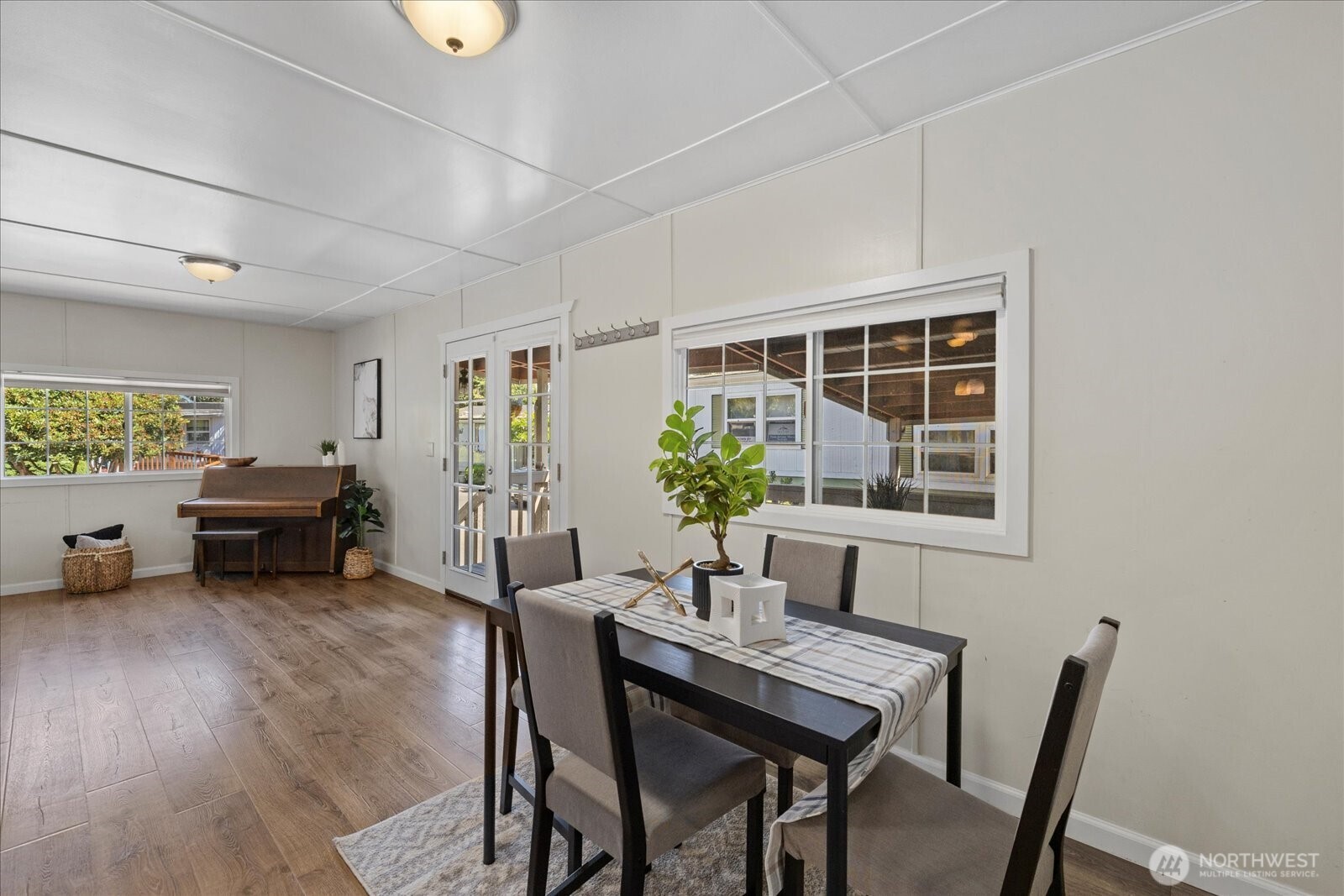 7301 Northeast 175th Street Kenmore, WA 98028 - Photo 18 of 28 a view of a dining room with furniture window and outside view