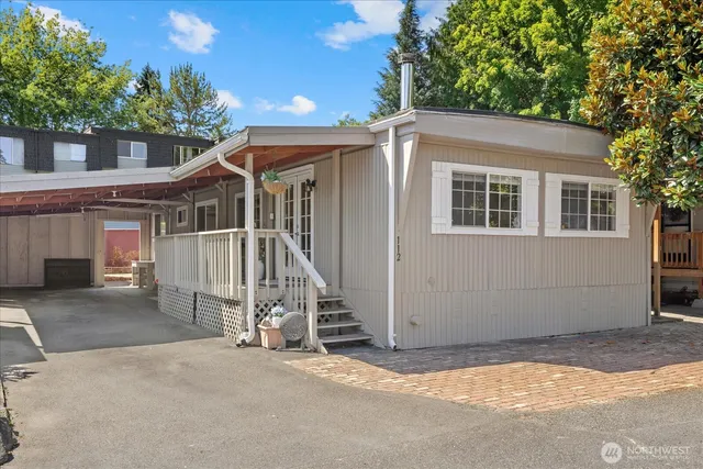 a view of a house with a park
