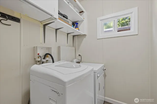 a utility room with dryer and washer