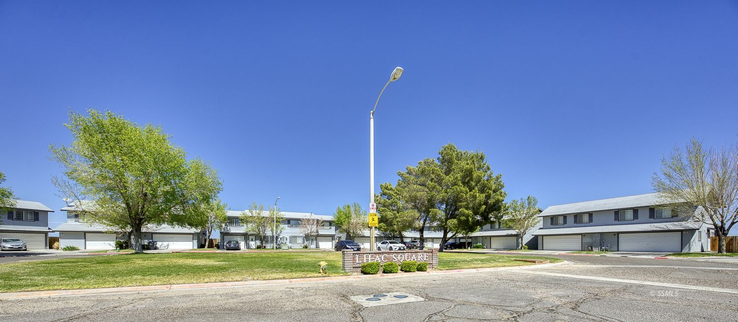 149 South Lilac Street Ridgecrest, CA 93555 - Photo 25 of 25 a front view of a building with a yard