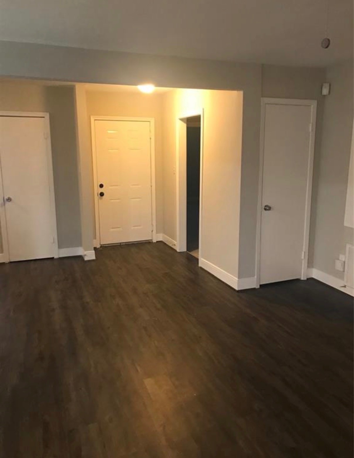 7230 England Street Houston, TX 77021 - Photo 5 of 15 an empty room with wooden floor and closet