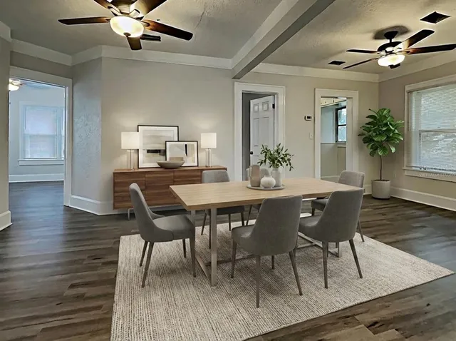 a view of a dining room with furniture and wooden floor