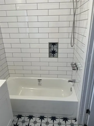 a bathroom with a bathtub