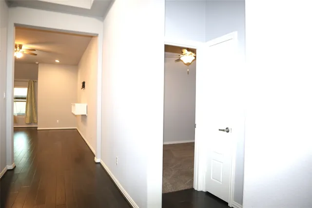 a view of a bathroom with a sink and a mirror