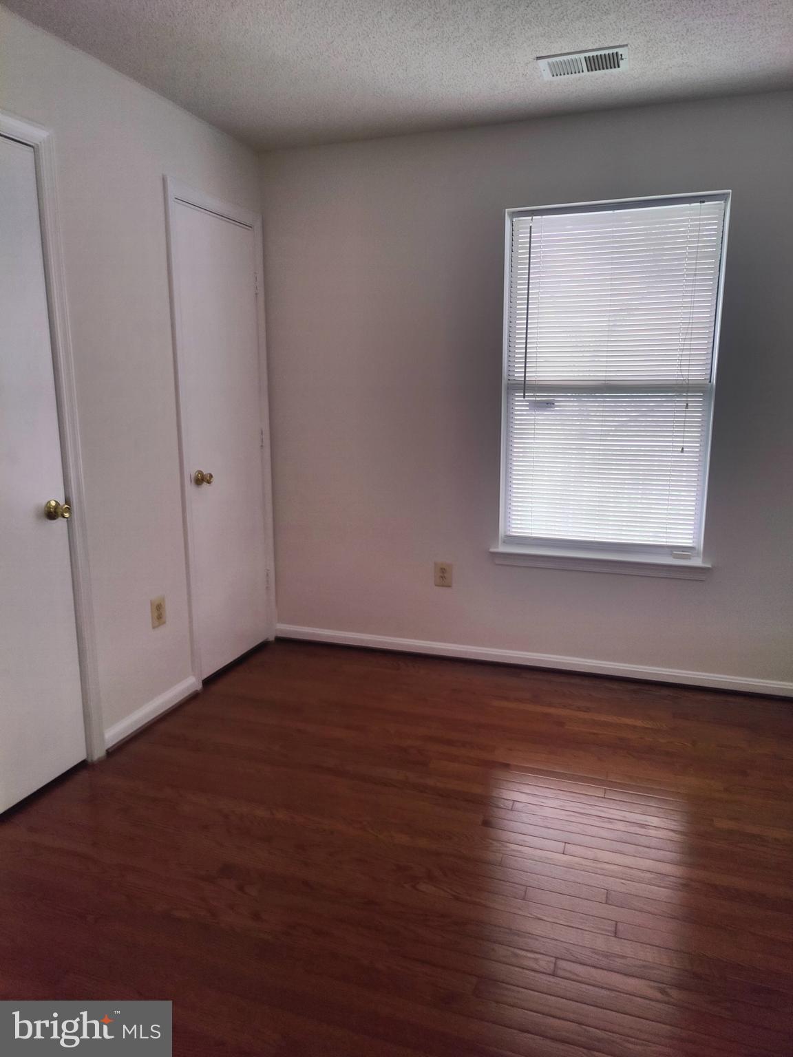 14202 Wolf Creek Place, Unit 726 Silver Spring, MD 20906 - Photo 20 of 20 Hardwood floors second bedroom