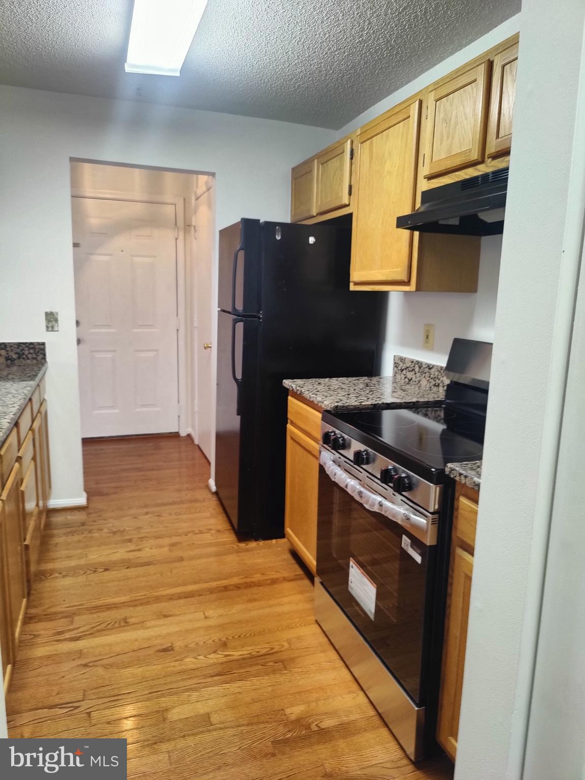 14202 Wolf Creek Place, Unit 726 Silver Spring, MD 20906 - Photo 9 of 20 Alley kitchen