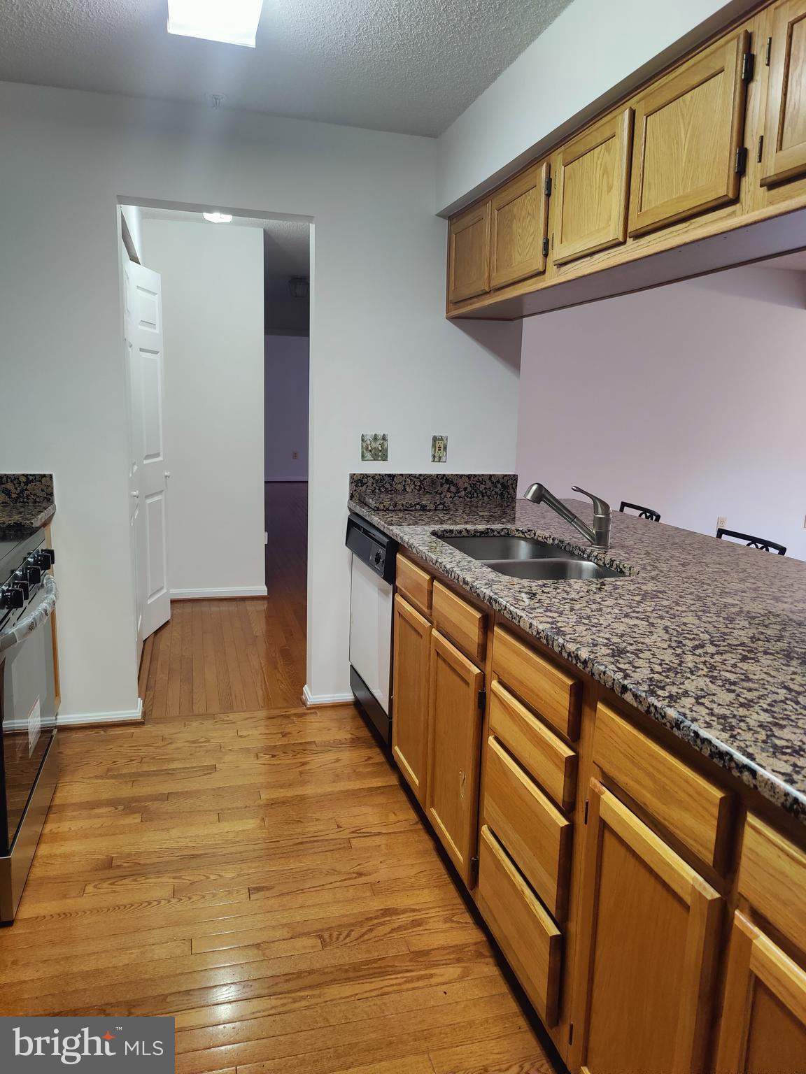 14202 Wolf Creek Place, Unit 726 Silver Spring, MD 20906 - Photo 10 of 20 Kitchen with granite counter tops