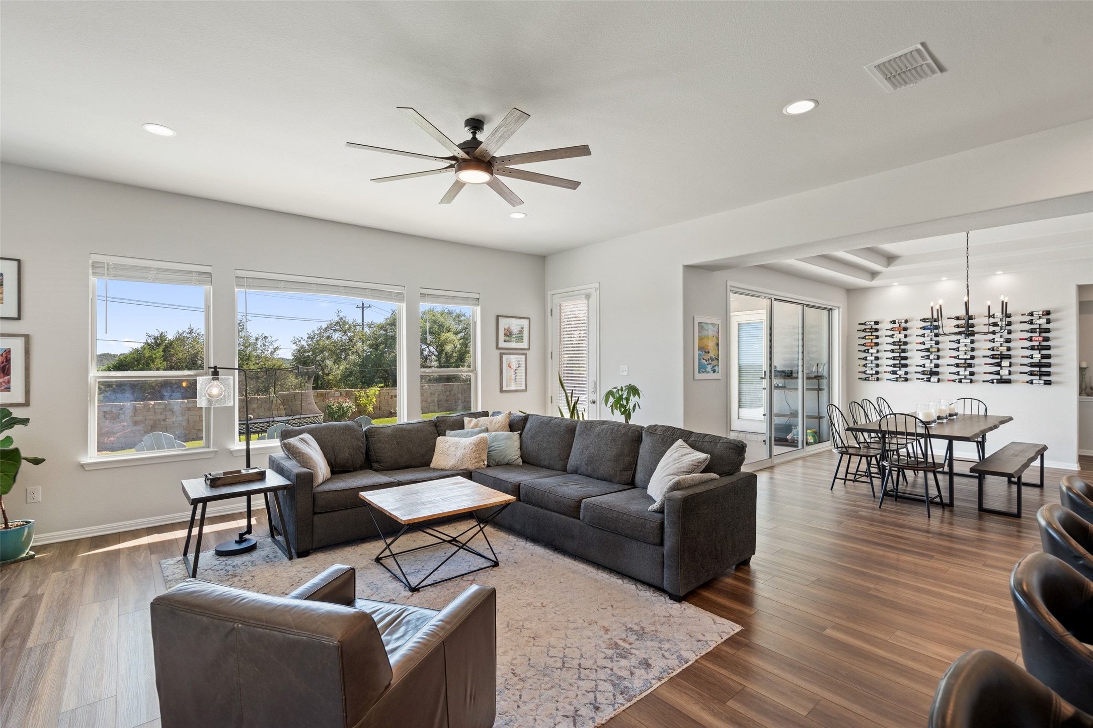 162 Lunar Loop Austin, TX 78737 - Photo 11 of 40 a living room with furniture and a large window