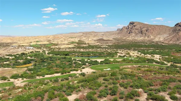 a view of a backyard of the house