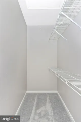 a view of small space with racks on the wall