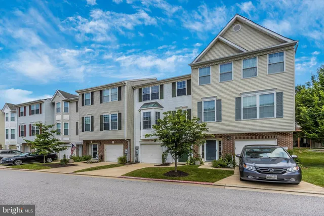 a car parked in front of a house