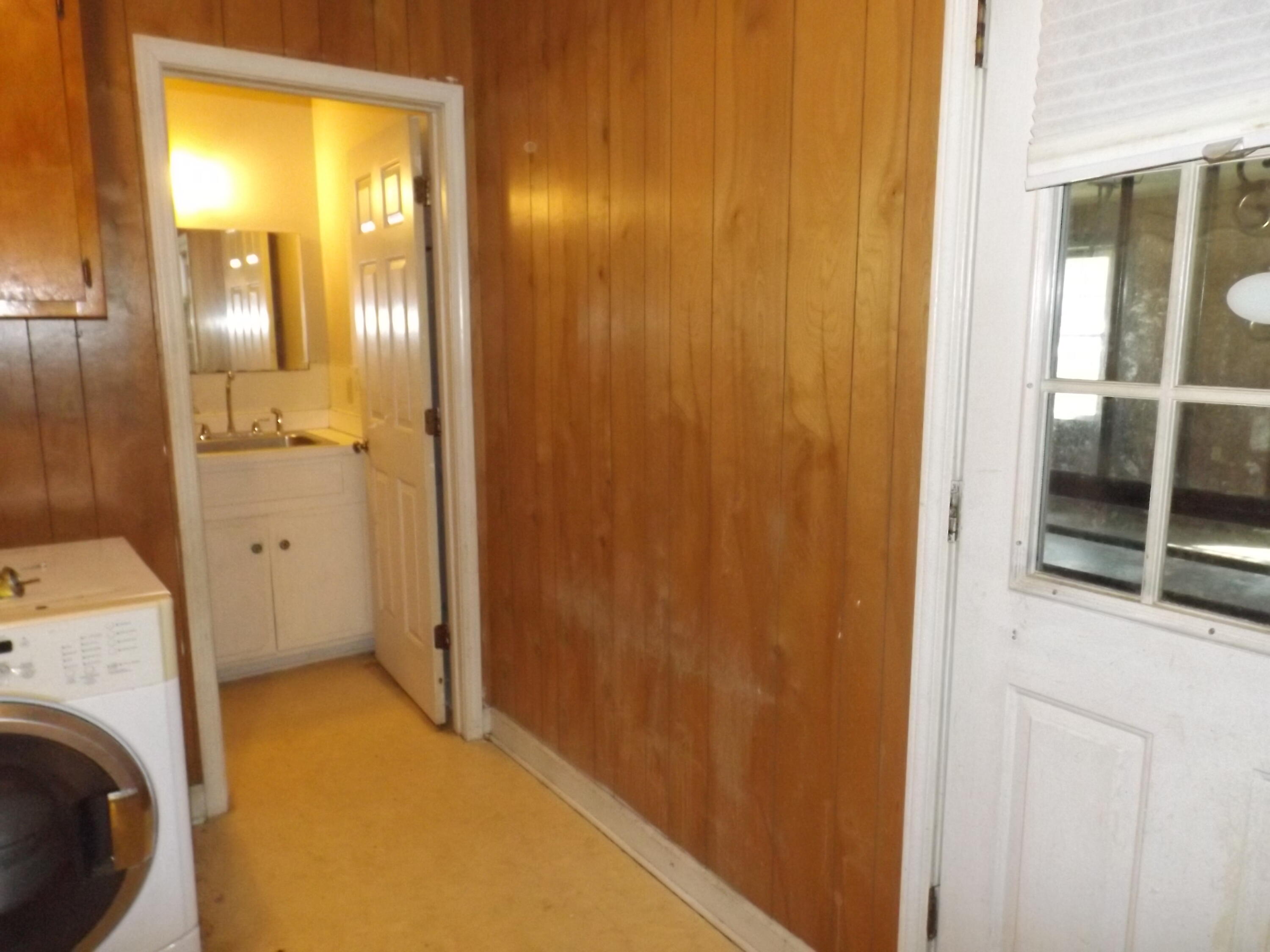 301 Brunson Street Manning, SC 29102 - Photo 22 of 38 Entry to Half-Bath off Utility Room
