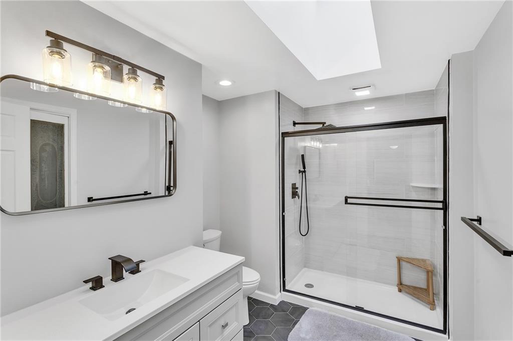 5866 Claridge Road Export, PA 15632 - Photo 21 of 35 Beautiful Primary bathroom with tiles shower and tons of natural light