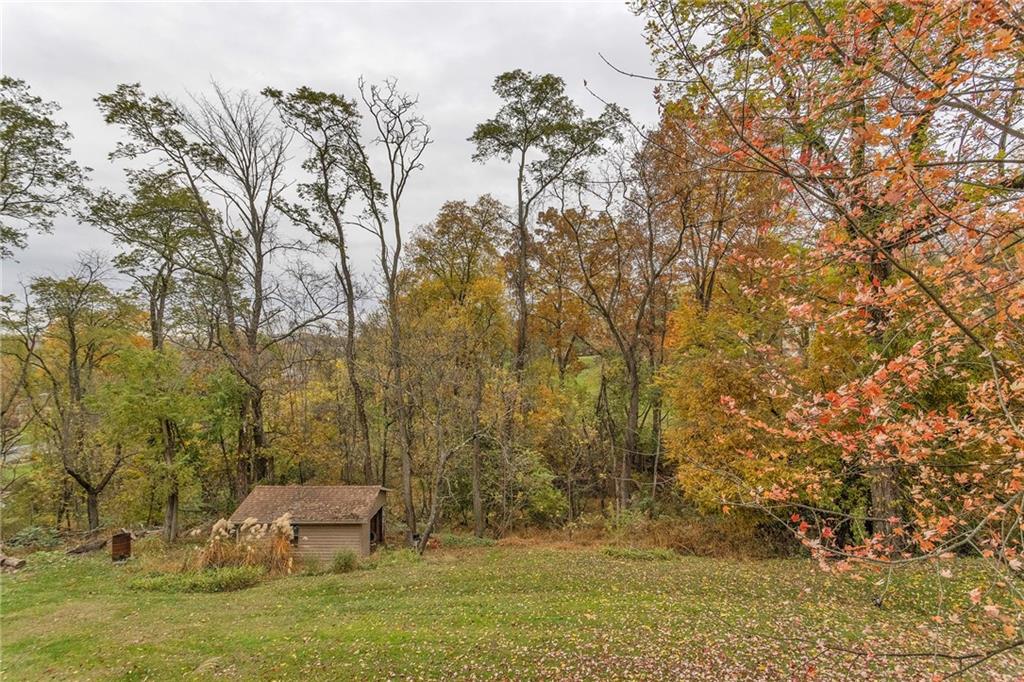 5866 Claridge Road Export, PA 15632 - Photo 30 of 35 Private Back yard with peaceful wooded backdrop.