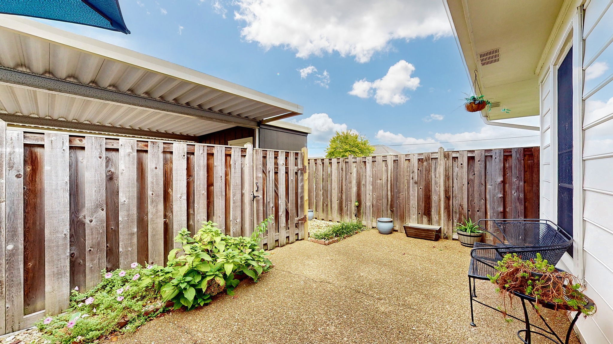 1128 General George Patton Road Nashville, TN 37221 - Photo 24 of 27 a view of a chair with potted plants