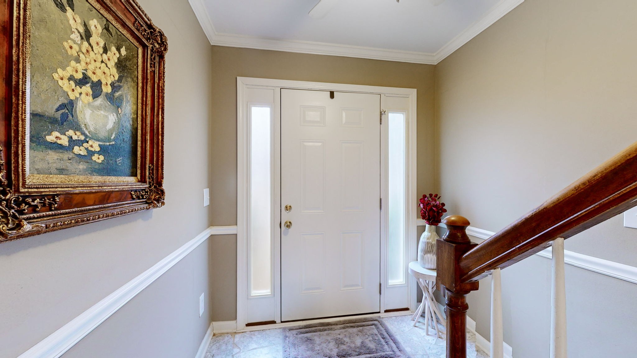 1128 General George Patton Road Nashville, TN 37221 - Photo 6 of 27 a view of a hallway with paintings on the wall