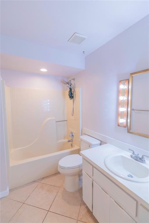 3908 Rosedale Drive Brandon, FL 33511 - Photo 14 of 44 a bathroom with a granite countertop sink a toilet and shower