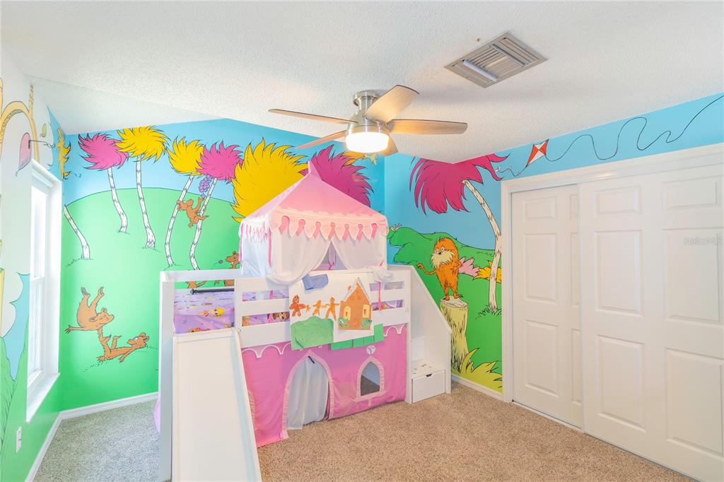 3908 Rosedale Drive Brandon, FL 33511 - Photo 16 of 44 a bed room with a bed and a dresser