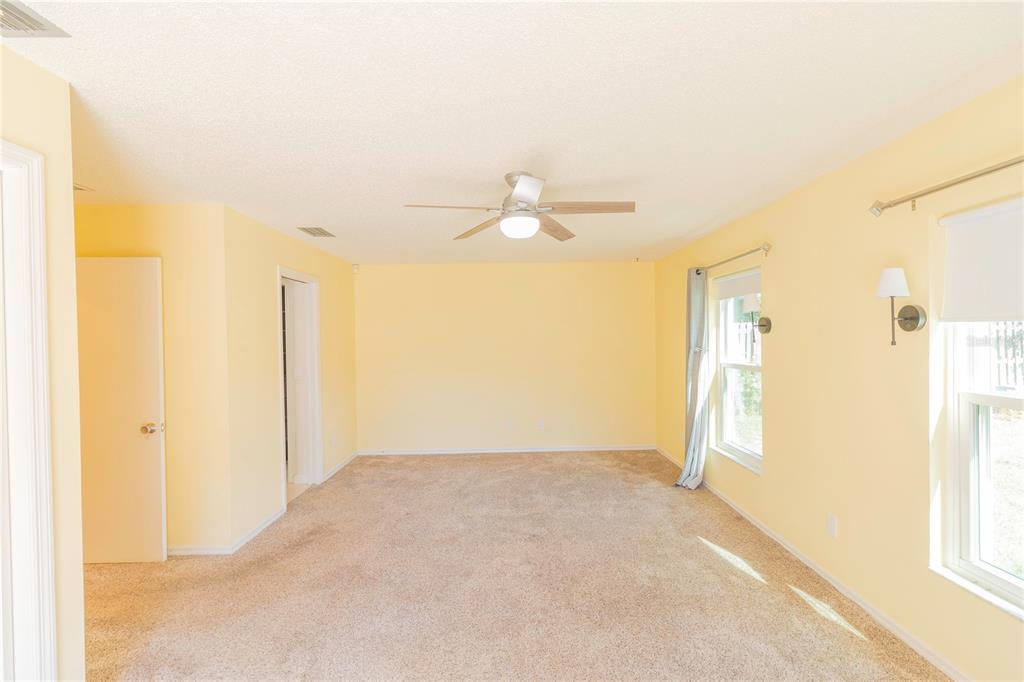 3908 Rosedale Drive Brandon, FL 33511 - Photo 18 of 44 a view of an empty room with a window