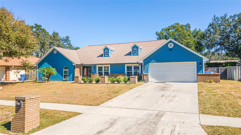 3908 Rosedale Drive Brandon, FL 33511 - Photo 3 of 44 a front view of house with yard