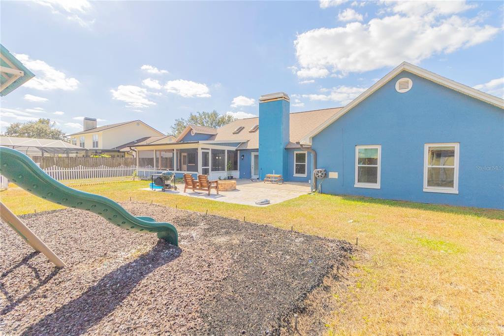 3908 Rosedale Drive Brandon, FL 33511 - Photo 44 of 44 a house with swimming pool in front of it