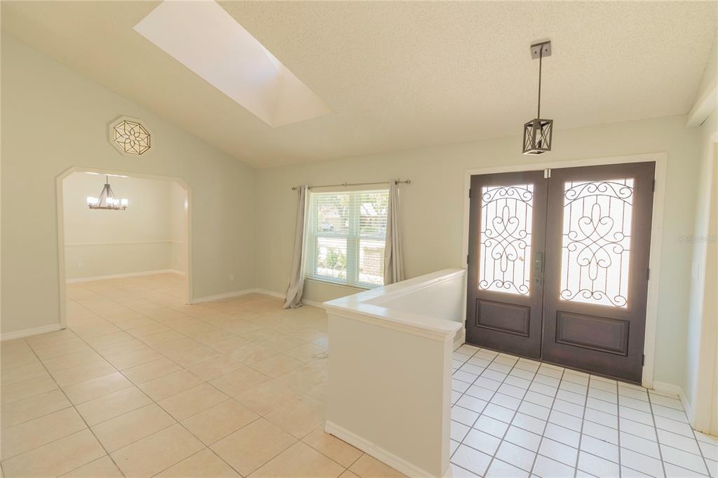 3908 Rosedale Drive Brandon, FL 33511 - Photo 6 of 44 a view of an empty room with window