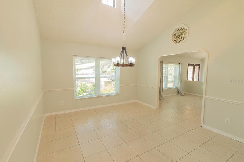 3908 Rosedale Drive Brandon, FL 33511 - Photo 9 of 44 a view of an empty room with a window
