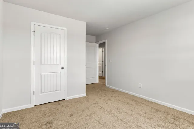 an empty room with an entryway