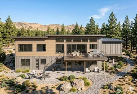 a view of house with outdoor seating