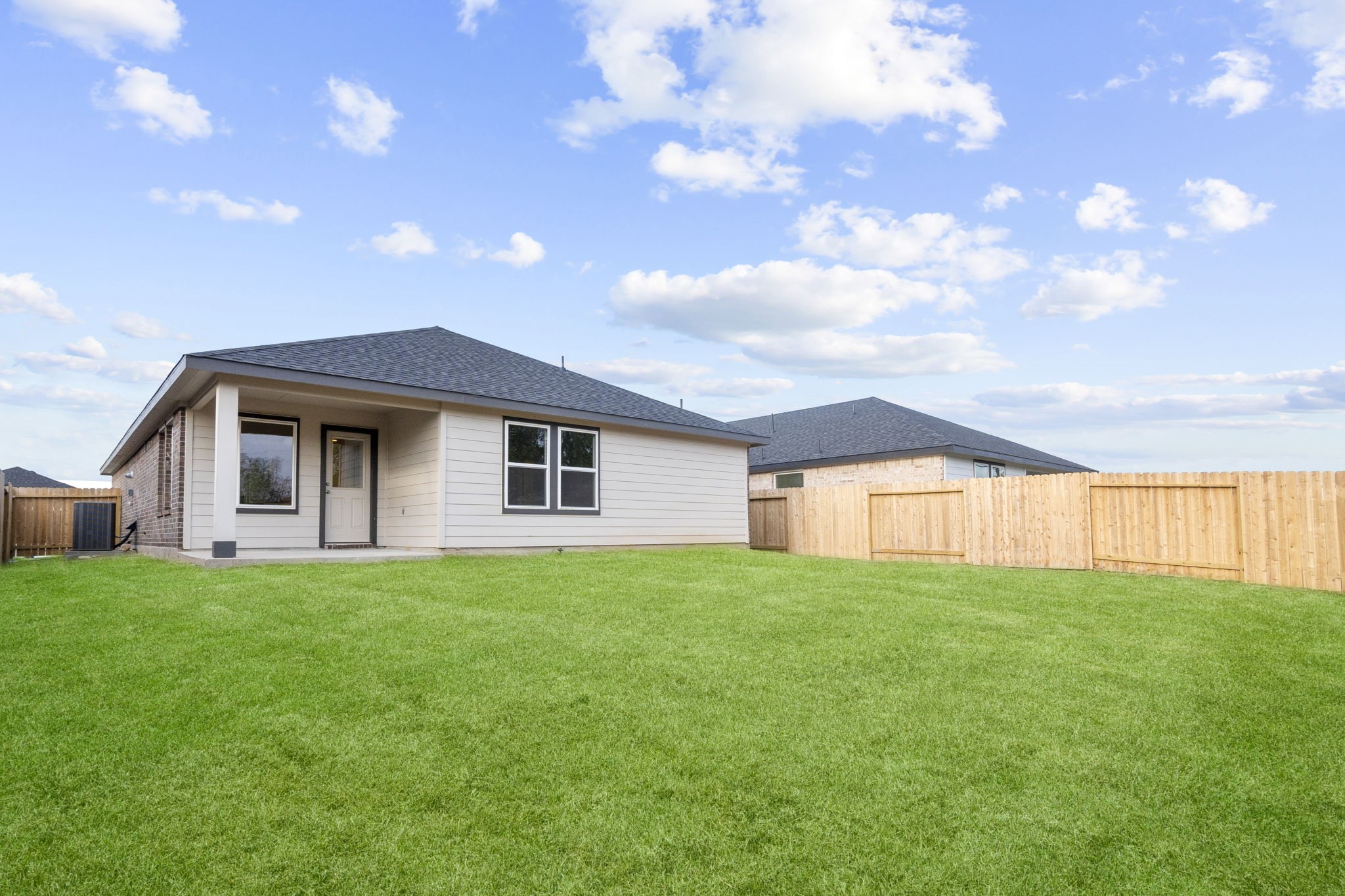 11 Robin Court Angleton, TX 77515 - Photo 16 of 21 a big house with a big yard and large trees