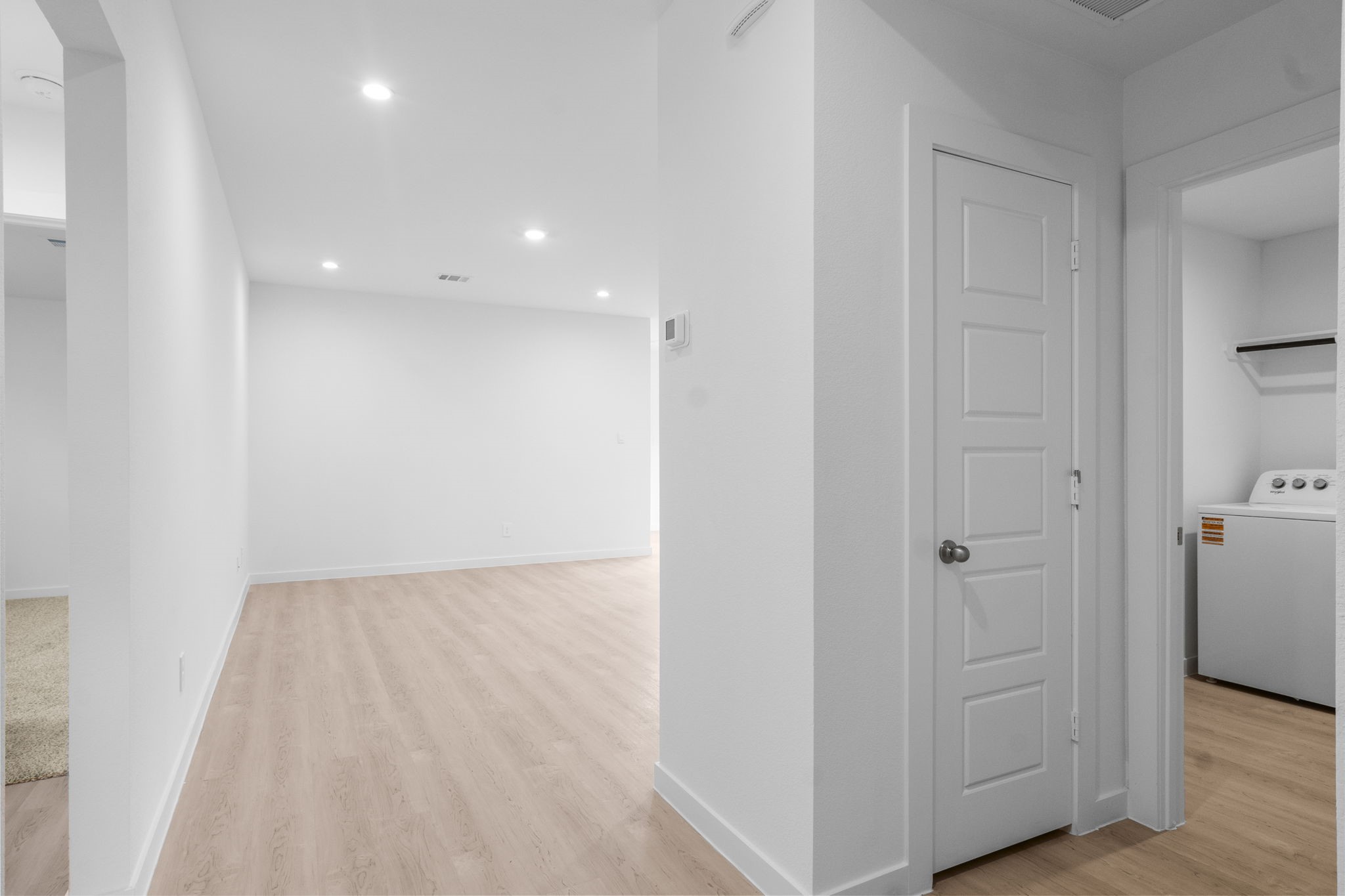 11 Robin Court Angleton, TX 77515 - Photo 5 of 21 a view of hallway with a wooden floor