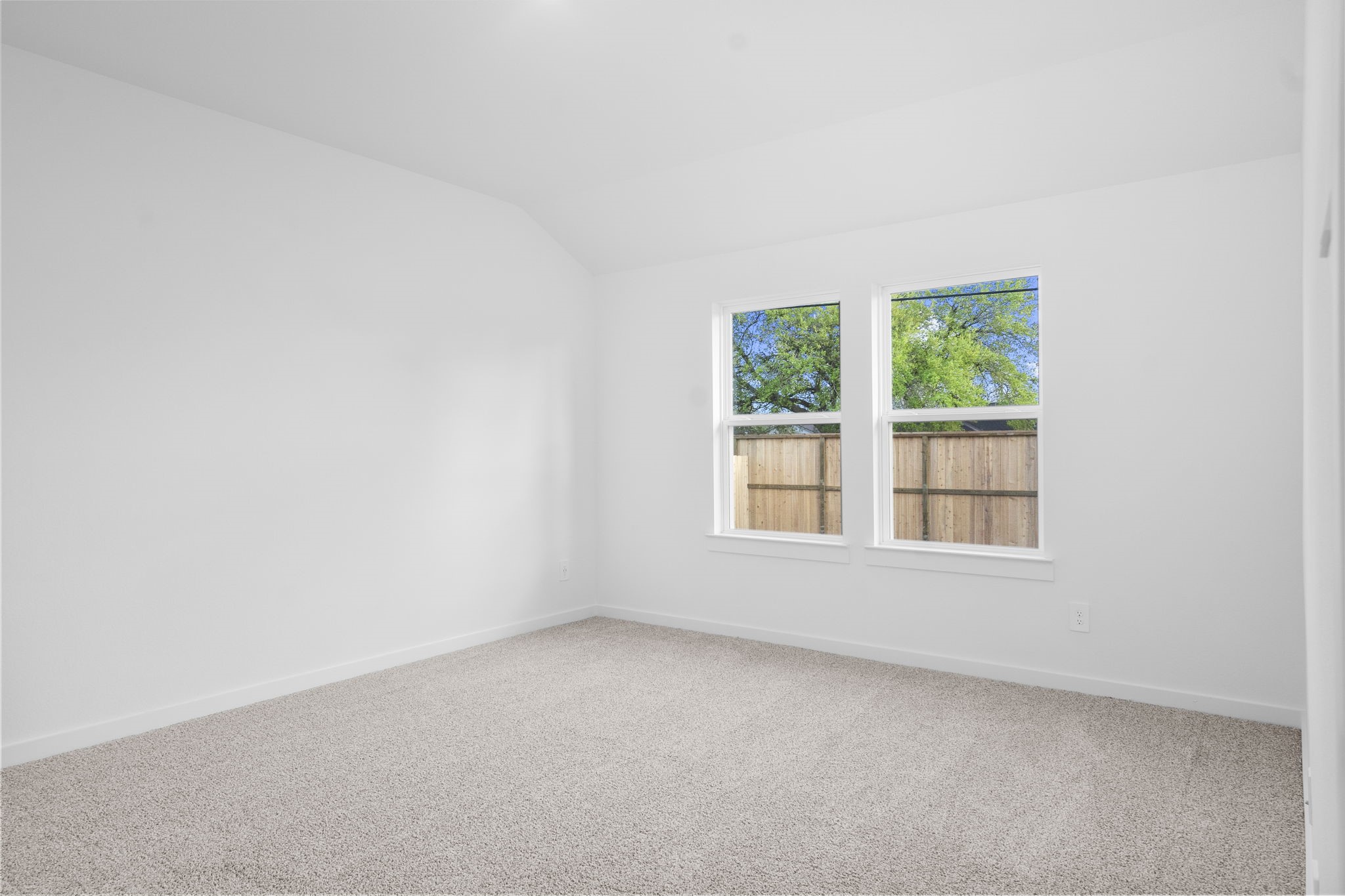 11 Robin Court Angleton, TX 77515 - Photo 8 of 21 an empty room with a window