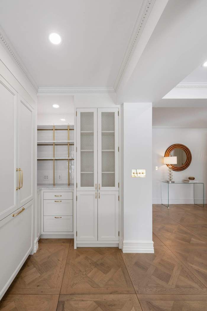 47 East 87th Street, Unit 7A Manhattan, NY 10128 - Photo 13 of 14 a view of a room with shelves