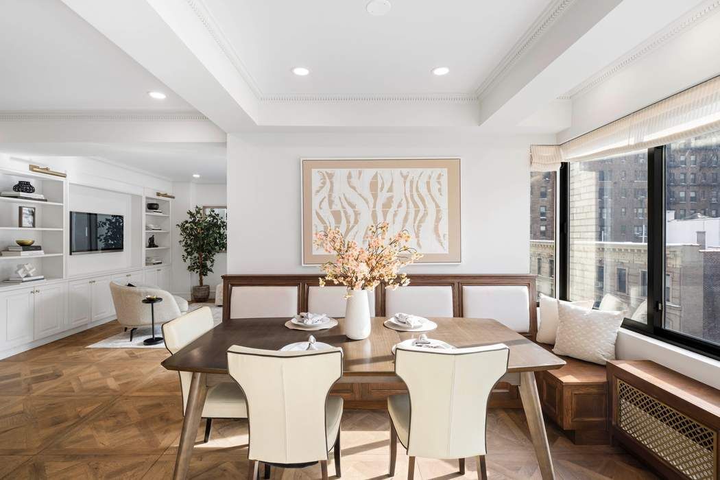 47 East 87th Street, Unit 7A Manhattan, NY 10128 - Photo 4 of 14 a view of a dining room with furniture window and outside view