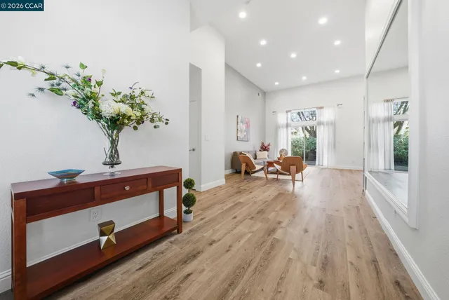 an entryway at livingroom with furniture and wooden floor