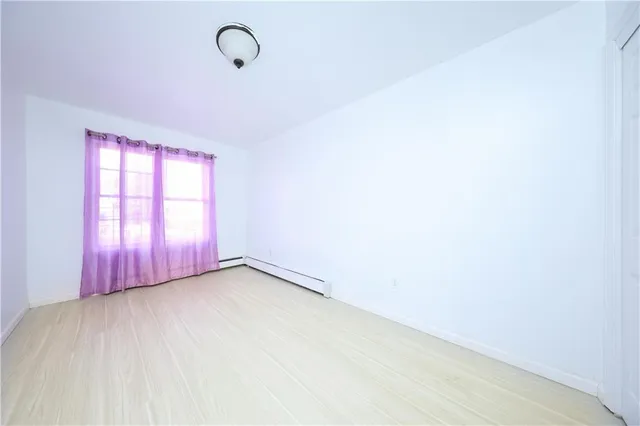 a view of a room with windows