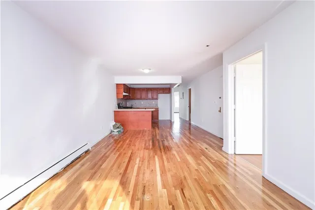 a bed room with a bed and a window