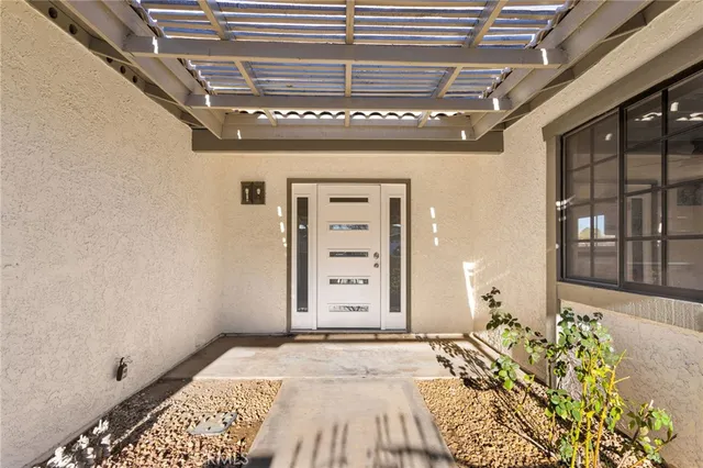 a view of a walk in front of house