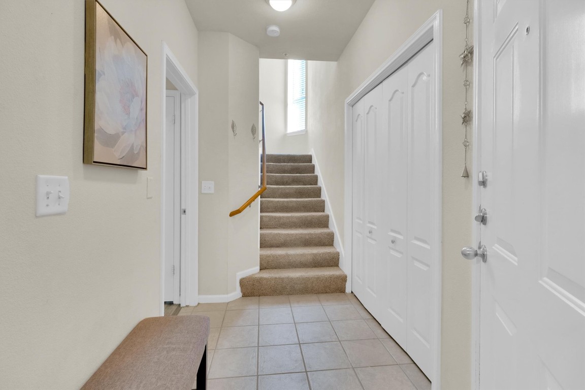 11203 Ranch Road 2222, Unit 2305 Austin, TX 78730 - Photo 14 of 36 a view of an entryway with staircase