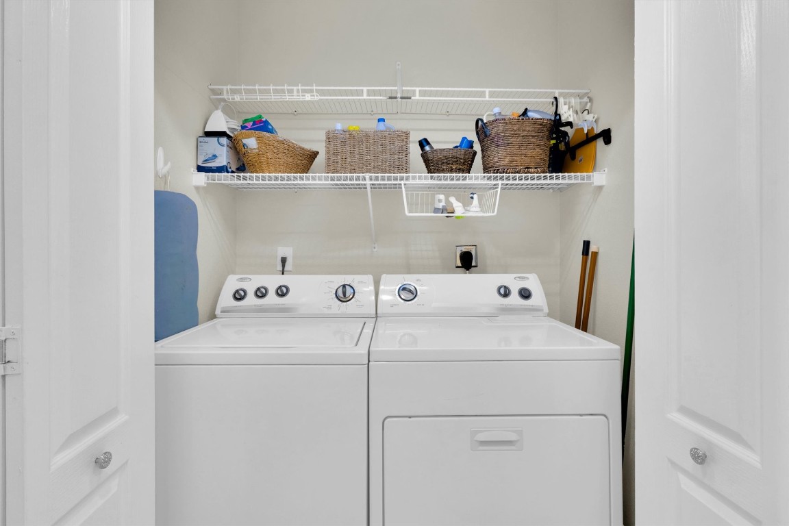 11203 Ranch Road 2222, Unit 2305 Austin, TX 78730 - Photo 18 of 36 a utility room with dryer and washer