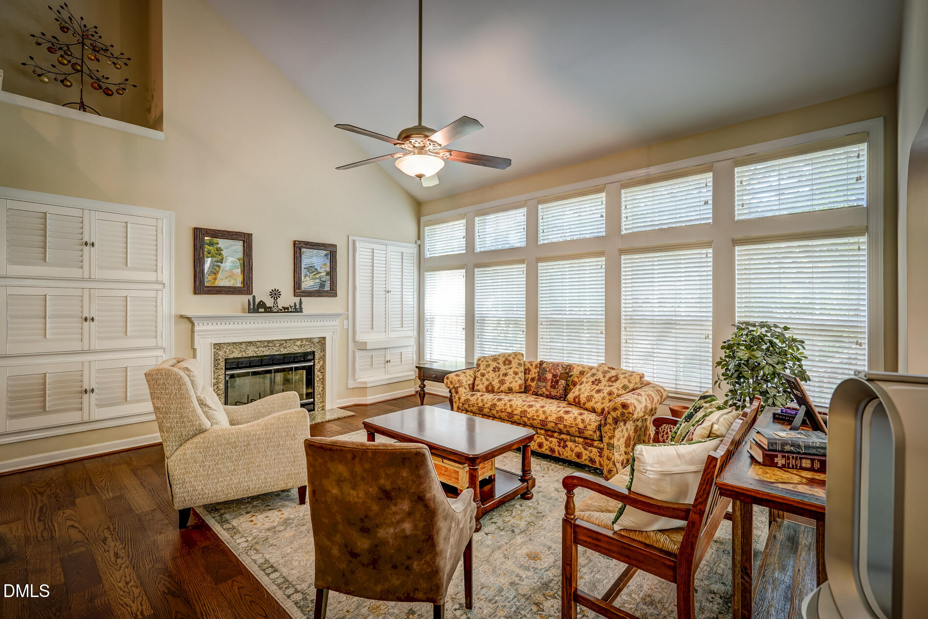 12212 Ashton Woods Lane Raleigh, NC 27614 - Photo 15 of 50 a living room with furniture and a fireplace