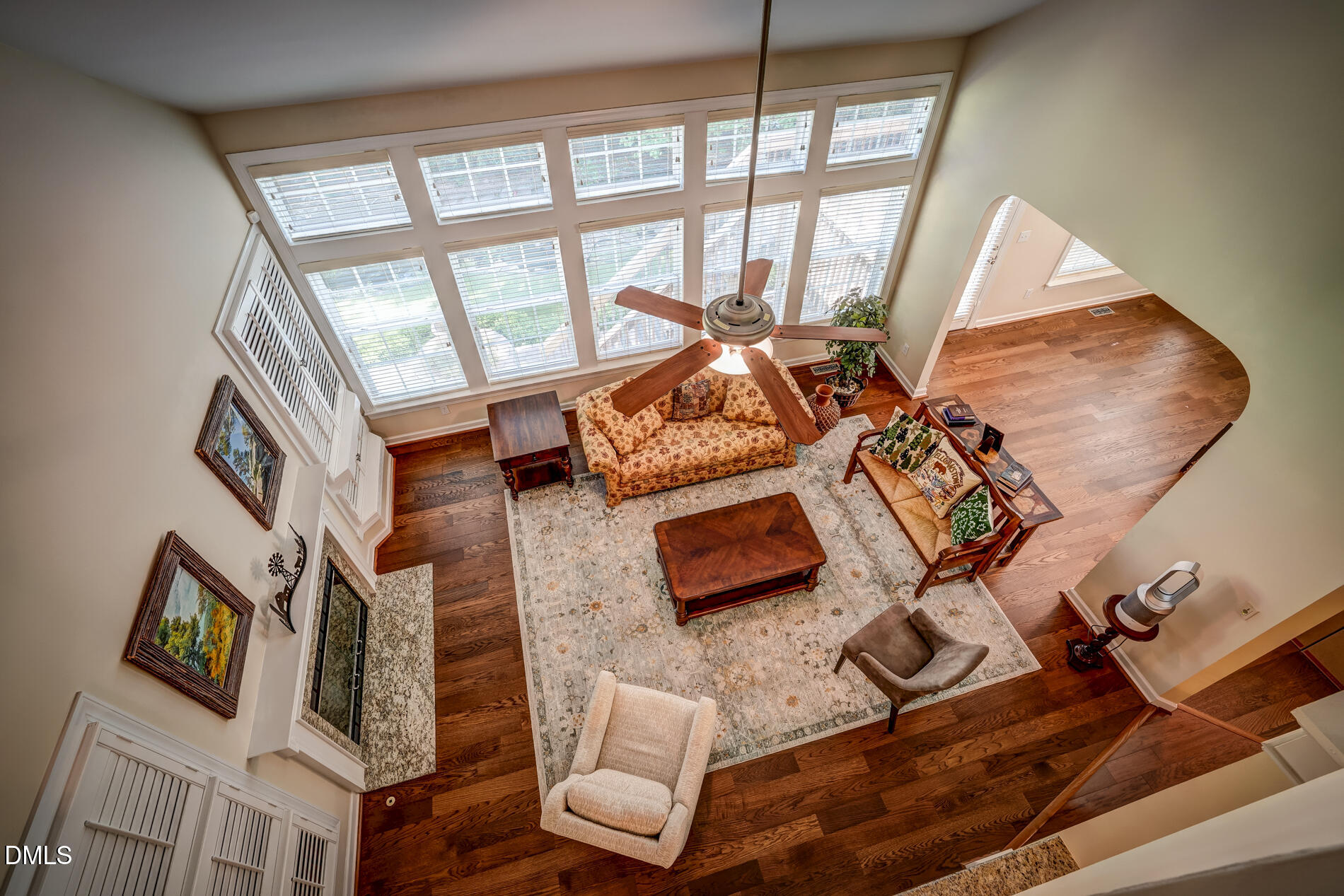 12212 Ashton Woods Lane Raleigh, NC 27614 - Photo 24 of 50 a living room with furniture and a floor to ceiling window