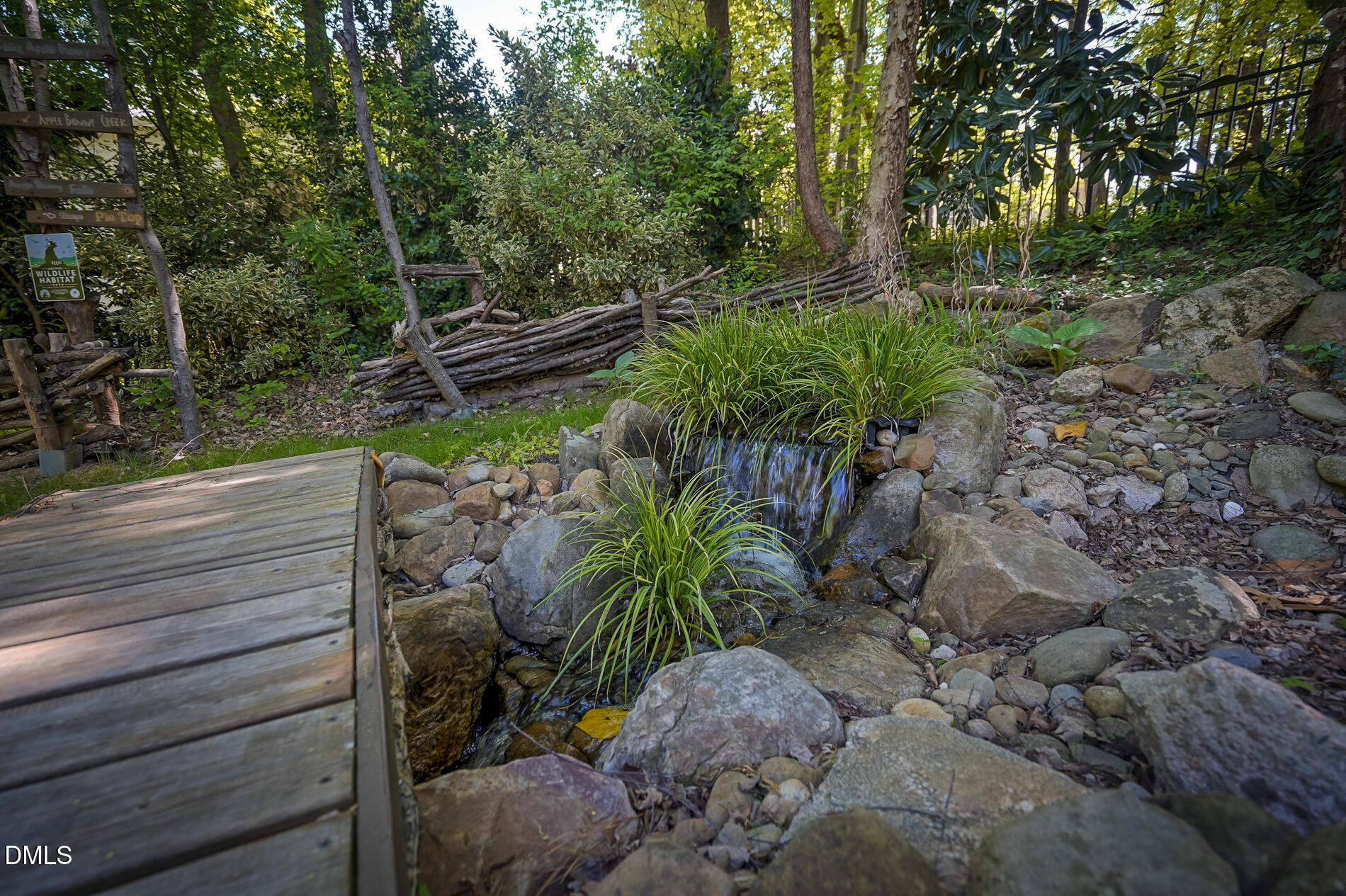 12212 Ashton Woods Lane Raleigh, NC 27614 - Photo 46 of 50 a view of a yard with plants and trees