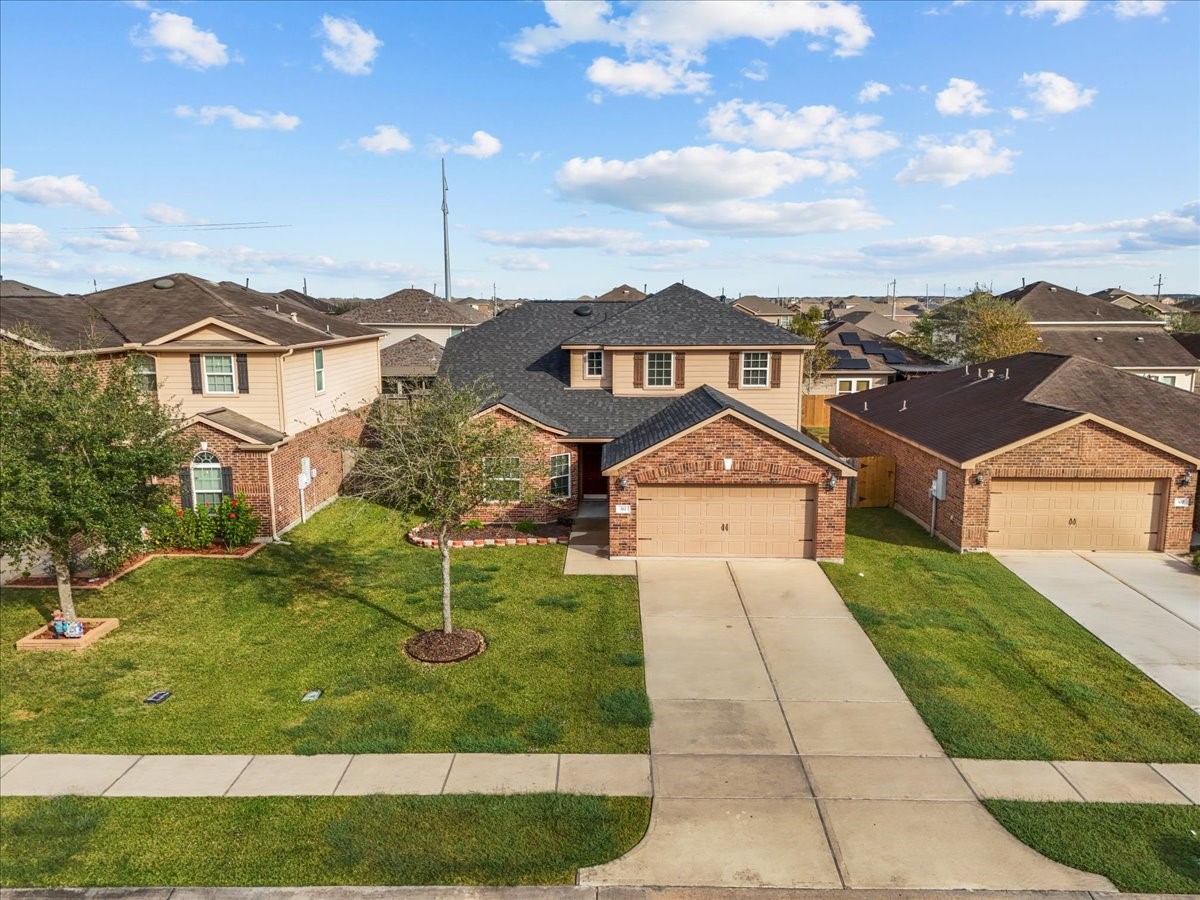 322 Shoshone Ridge Drive La Marque, TX 77568 - Photo 34 of 34 a front view of a house with a yard