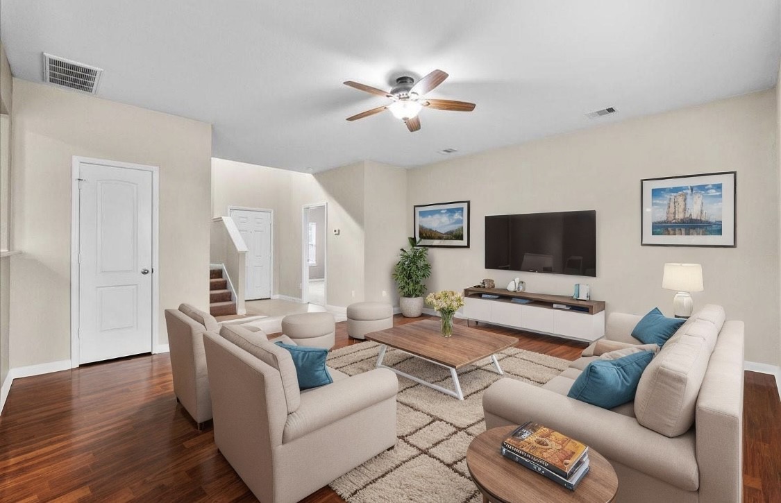 322 Shoshone Ridge Drive La Marque, TX 77568 - Photo 6 of 34 a living room with furniture and a flat screen tv