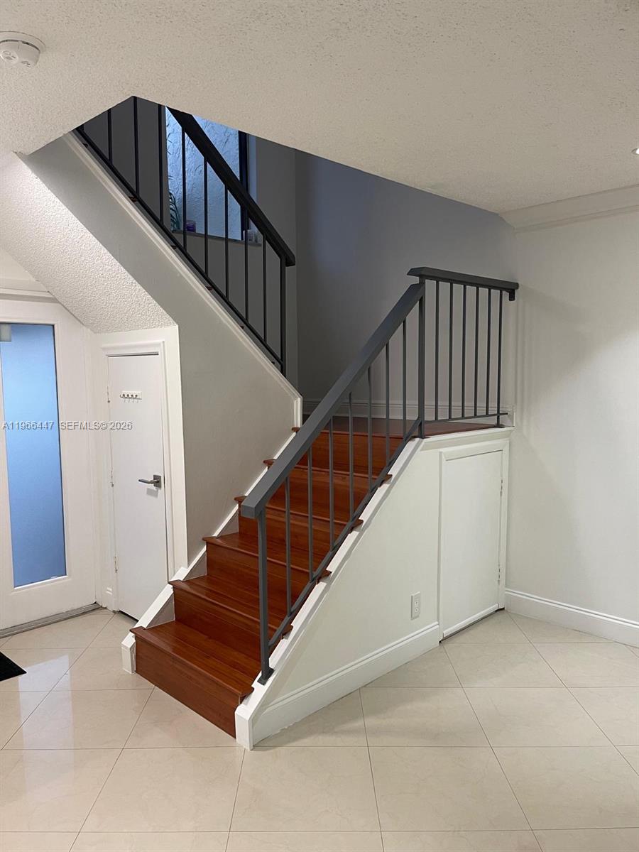 7200 Northwest 2nd Avenue, Unit 410 Boca Raton, FL 33487 - Photo 3 of 20 a view of entryway with stairs
