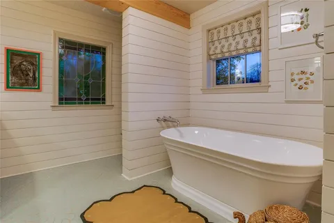 a bedroom with a bed and a cabinets