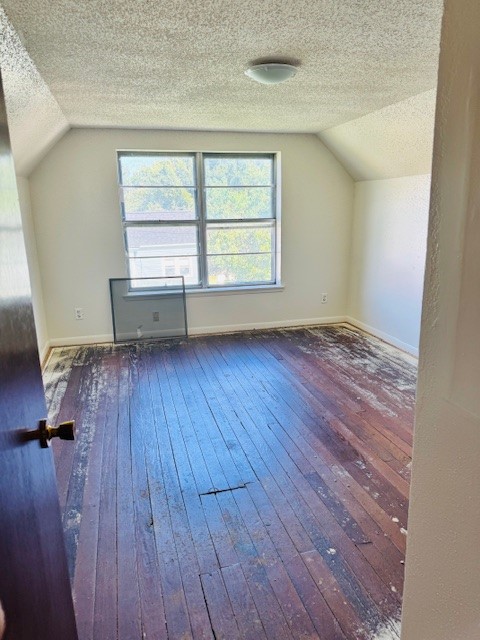 217 Main Street Palacios, TX 77465 - Photo 16 of 45 an empty room with wooden floor and a window
